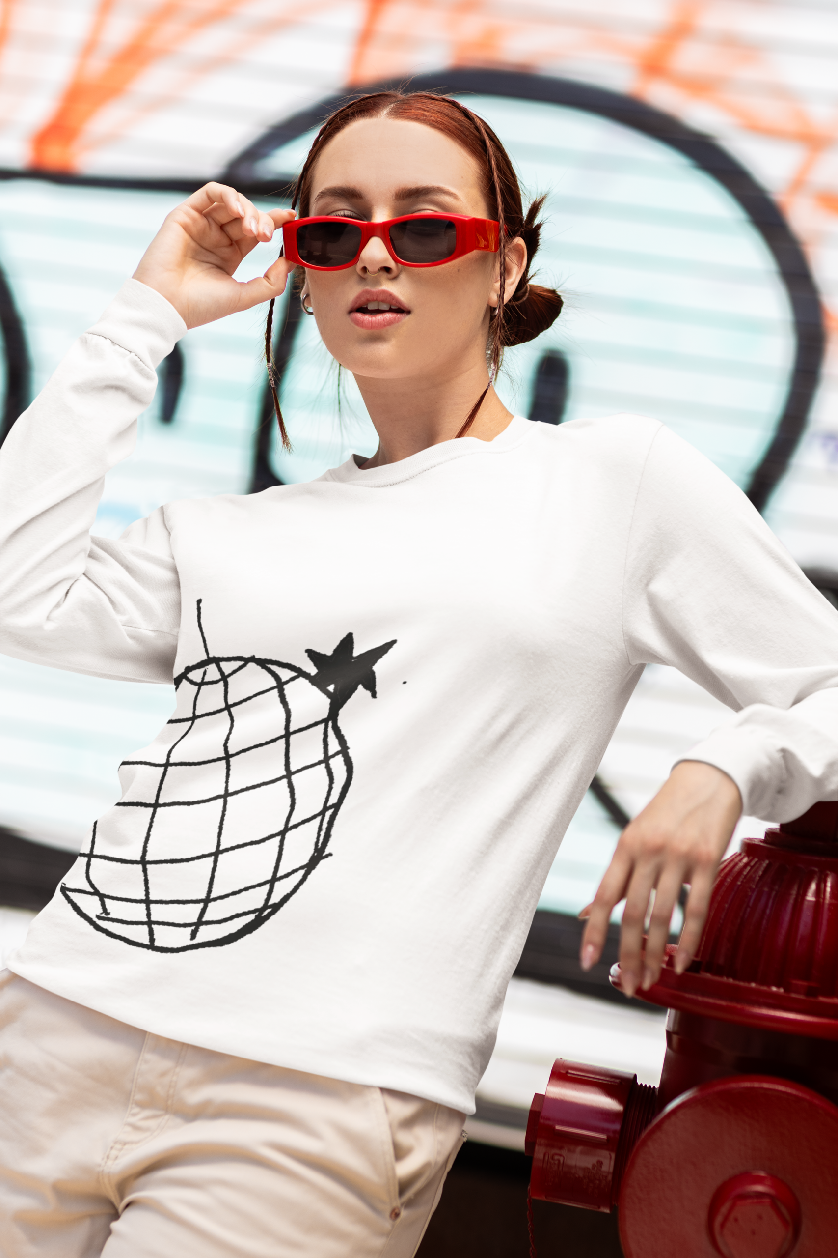 comfort colors mockup of a woman in a long sleeve tee posing by the street m55810